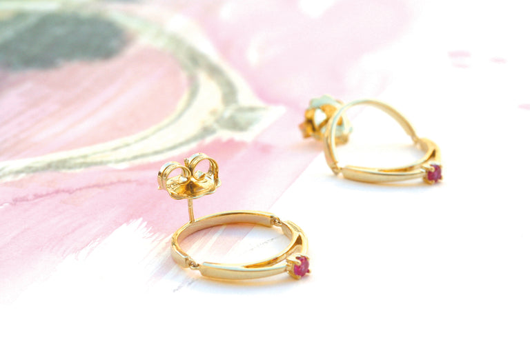 Earrings articulated ring